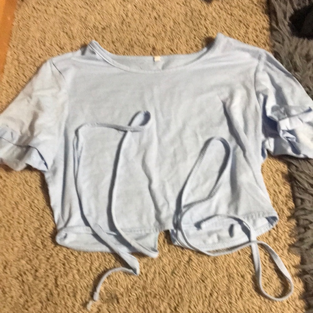 blue crop top with ties at the bottom